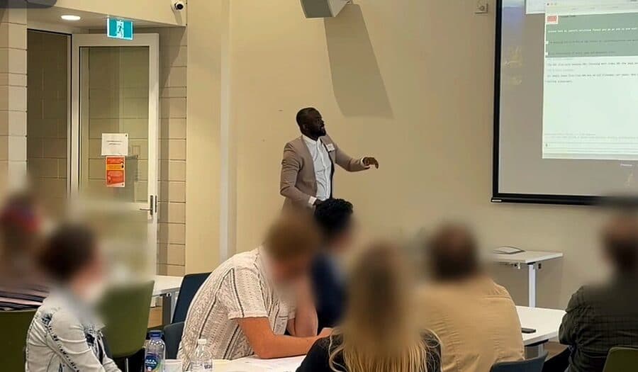 Noah teaching the room how to set up an AI Business Brain