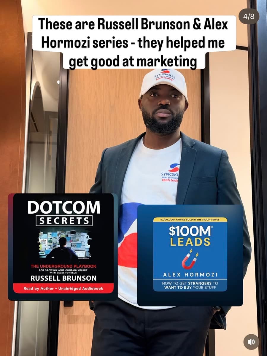 Noah holding DotCom Secrets and $100M Leads